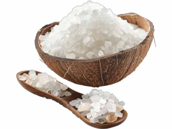 Rock salt fertilizer ring around coconut tree